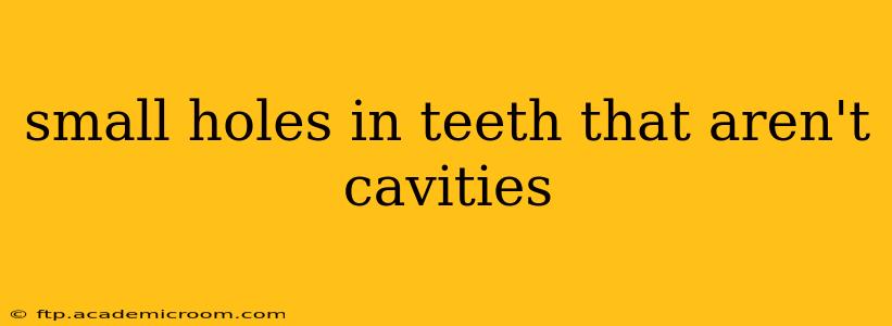 small holes in teeth that aren't cavities
