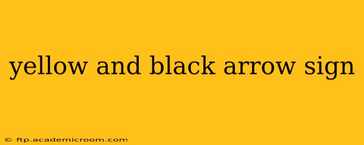 yellow and black arrow sign